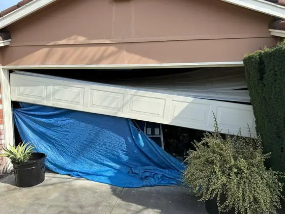 Damaged door section, opening covered before repair